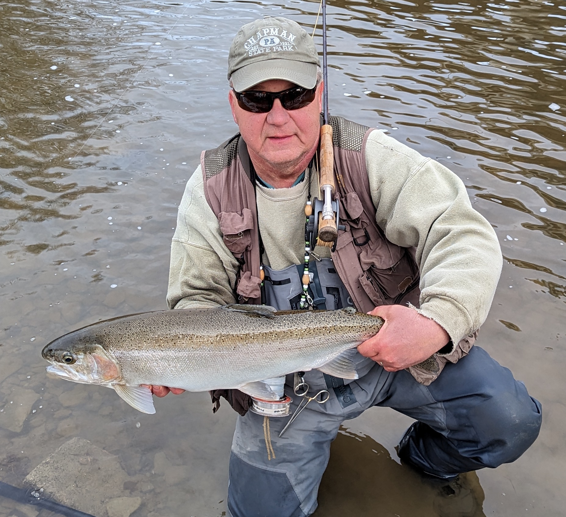 Man holding steelhead